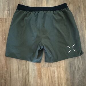 Dark green lined 7 inch ten thousand interval shorts size large